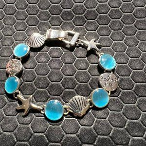 Star Fish, Seashells, and Sand Dollar Bracelet with Blue Sea Glass Made of Sterl